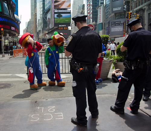 good news bad news cops times square mario brothers arrested costume